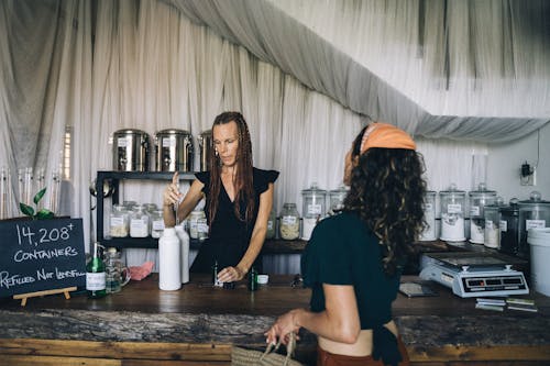 Women Standing at the Counter