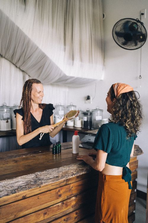 Free Two women socializing in a zero-waste store, highlighting eco friendliness. Stock Photo