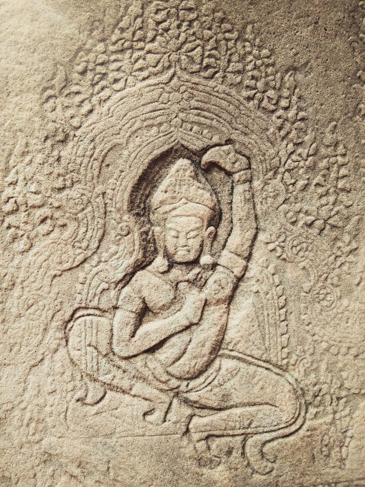 Carved Apsara On Wall