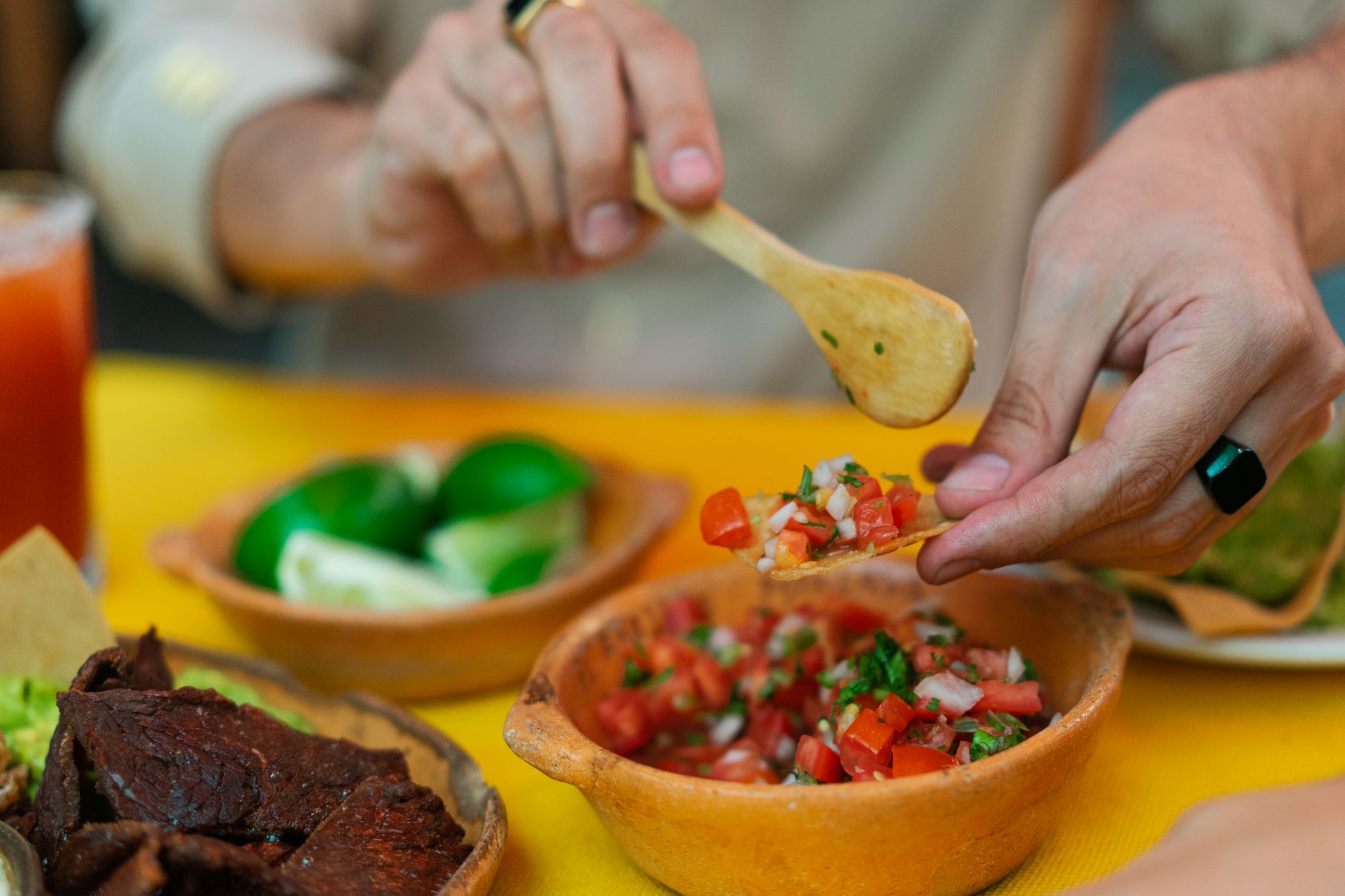 Fresh homemade restaurant-style salsa in a bowl with tortilla chips