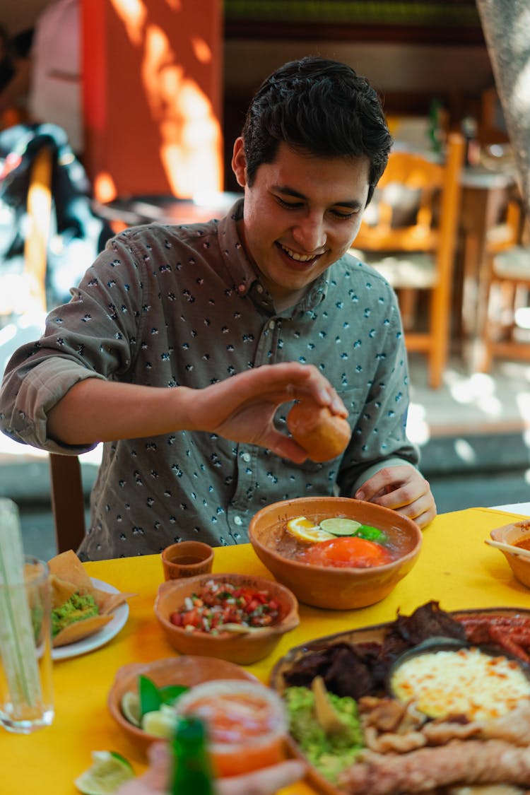 Man Eating Mexican Food