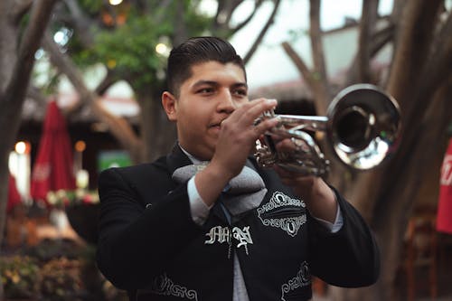 Free Man in Black Suit Jacket Playing Trumpet Stock Photo