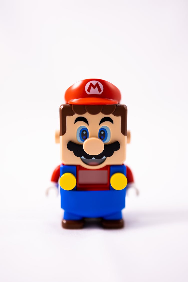 Colorful Plumber Toy On White Background