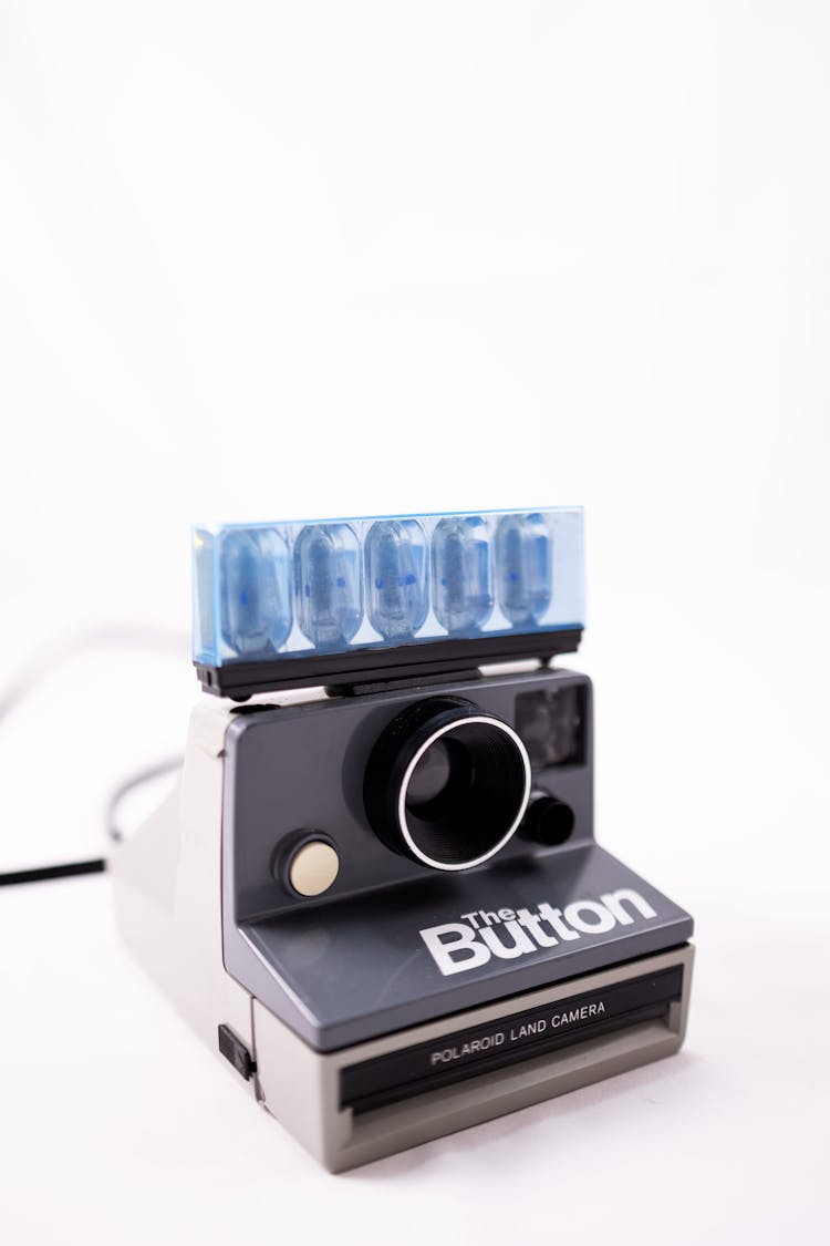 Retro Camera On White Backdrop