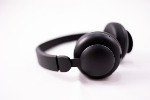 Modern headphones on white background