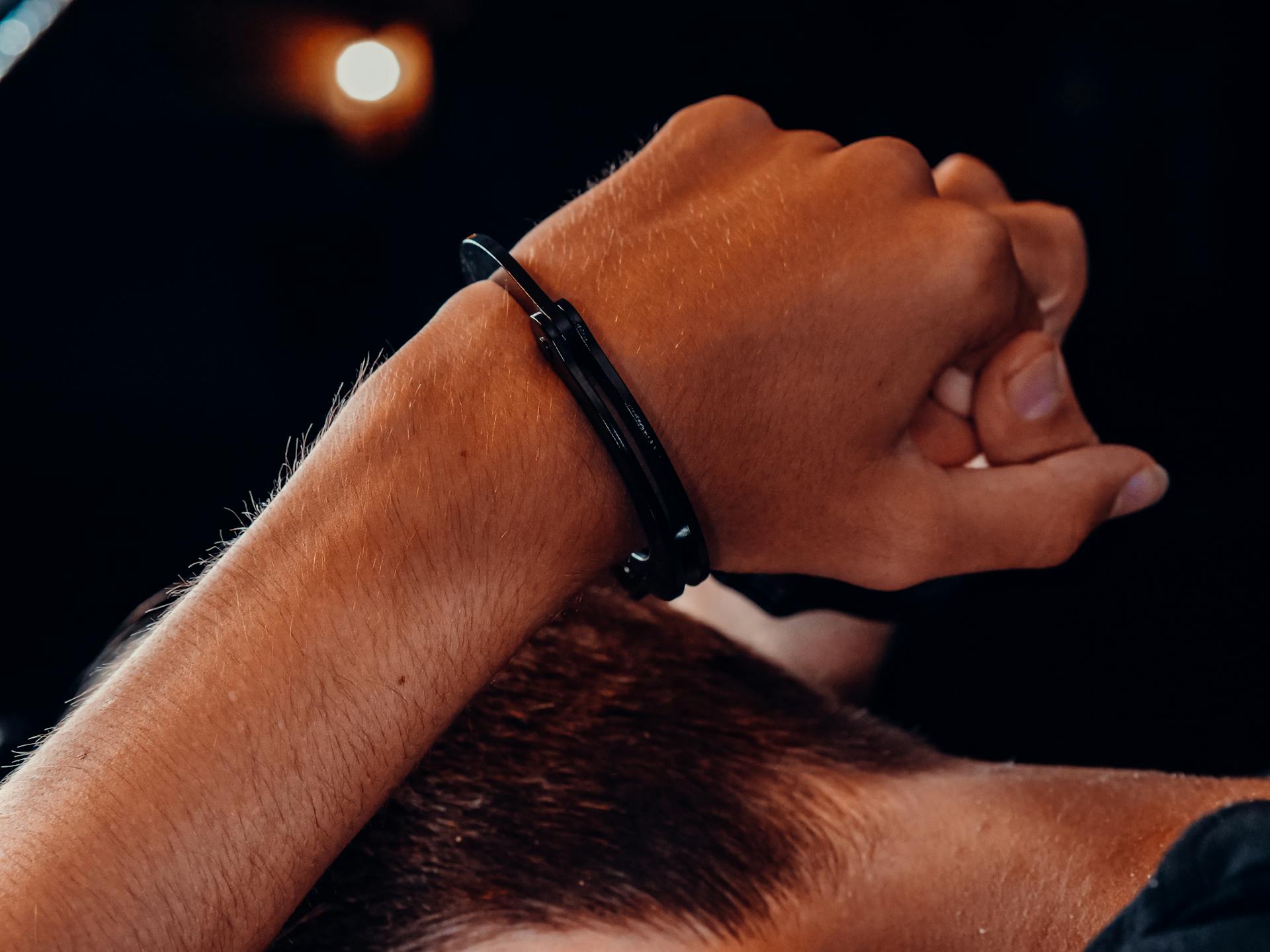 Hand of a Person with Handcuffs