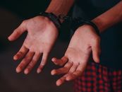 A Person in Handcuffs