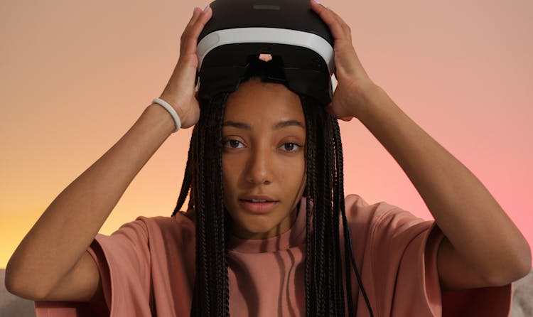 Close-Up Shot Of A Woman Wearing A VR Glasses