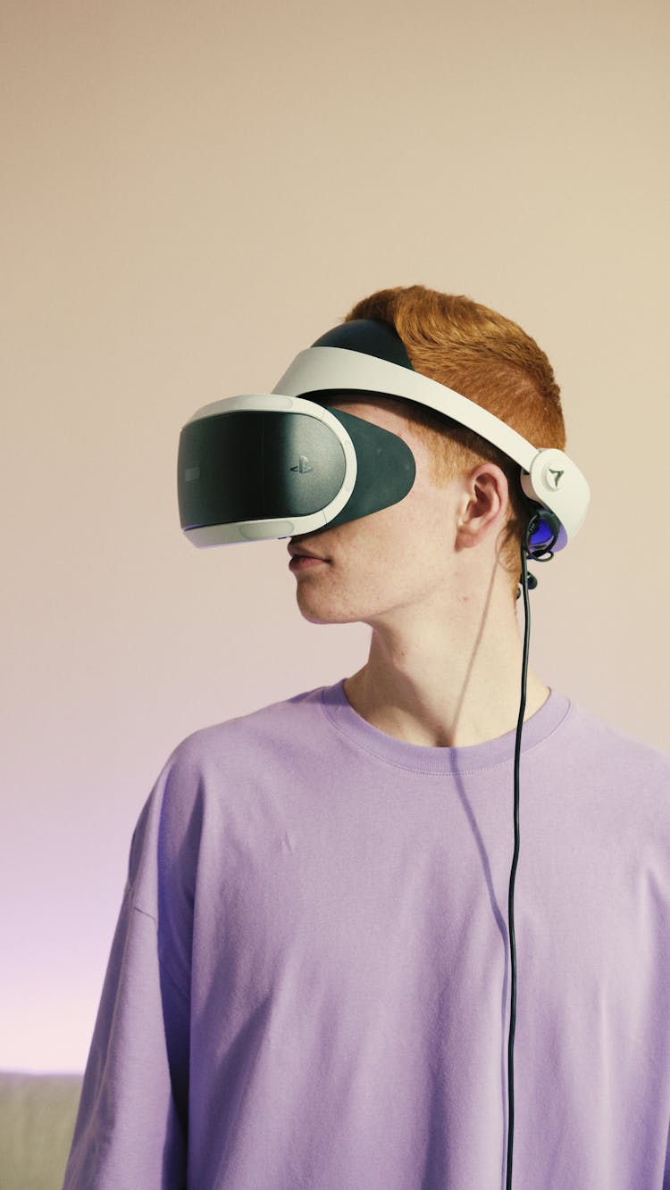 Side View Of A Person Playing PlayStation Vr