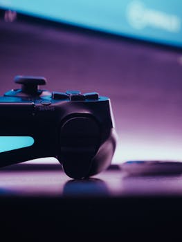 Close-up of a wireless game controller with neon lighting, offering a modern gaming vibe.