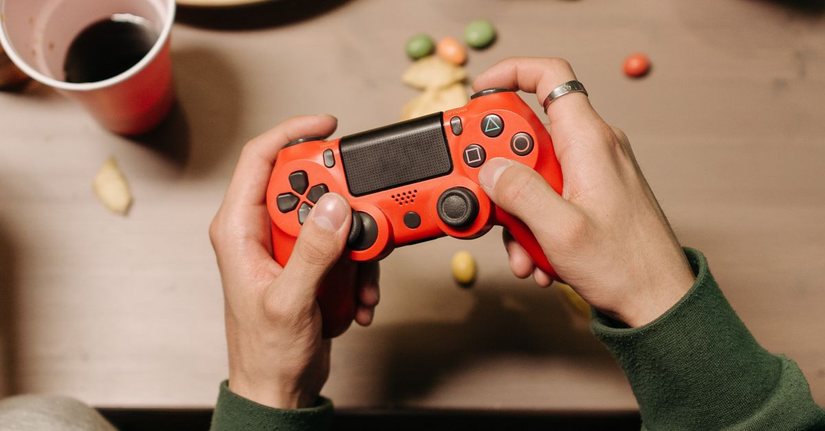 Playing Controller A Person Using a Game Controller · Free Stock Photo
