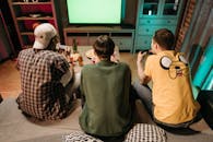 Friends Playing Video Game at Home