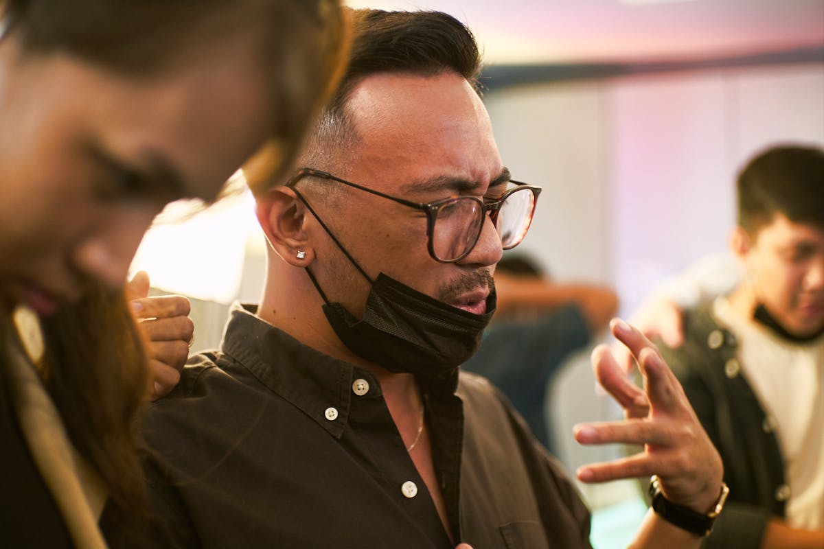 Person filming short-form video content about cryptocurrency charts on a smartphone