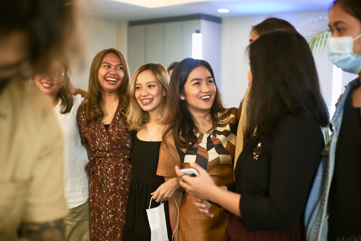 Cozy farming game scene with character tending crops near a wooden house
