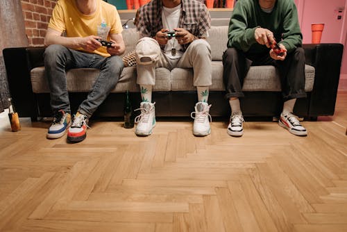 Group of Friend Playing a Game Console