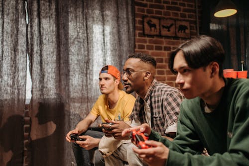Men Playing Video Game Together 
