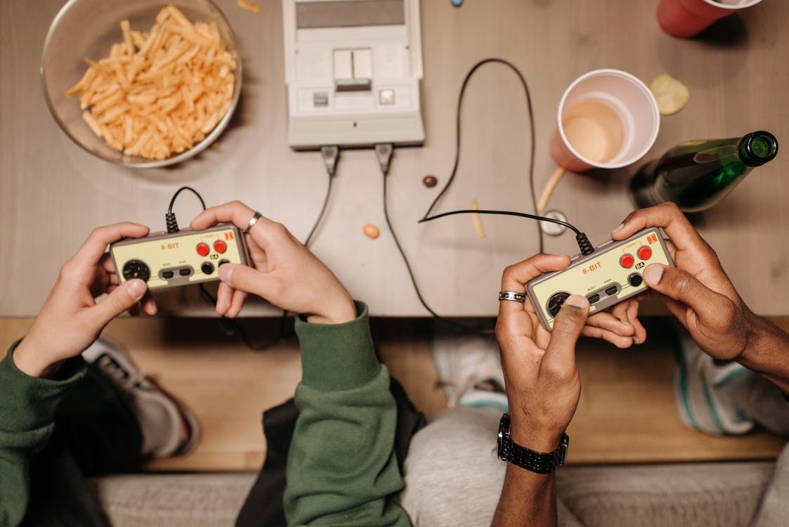 Free Friends Playing a Video Game Stock Photo