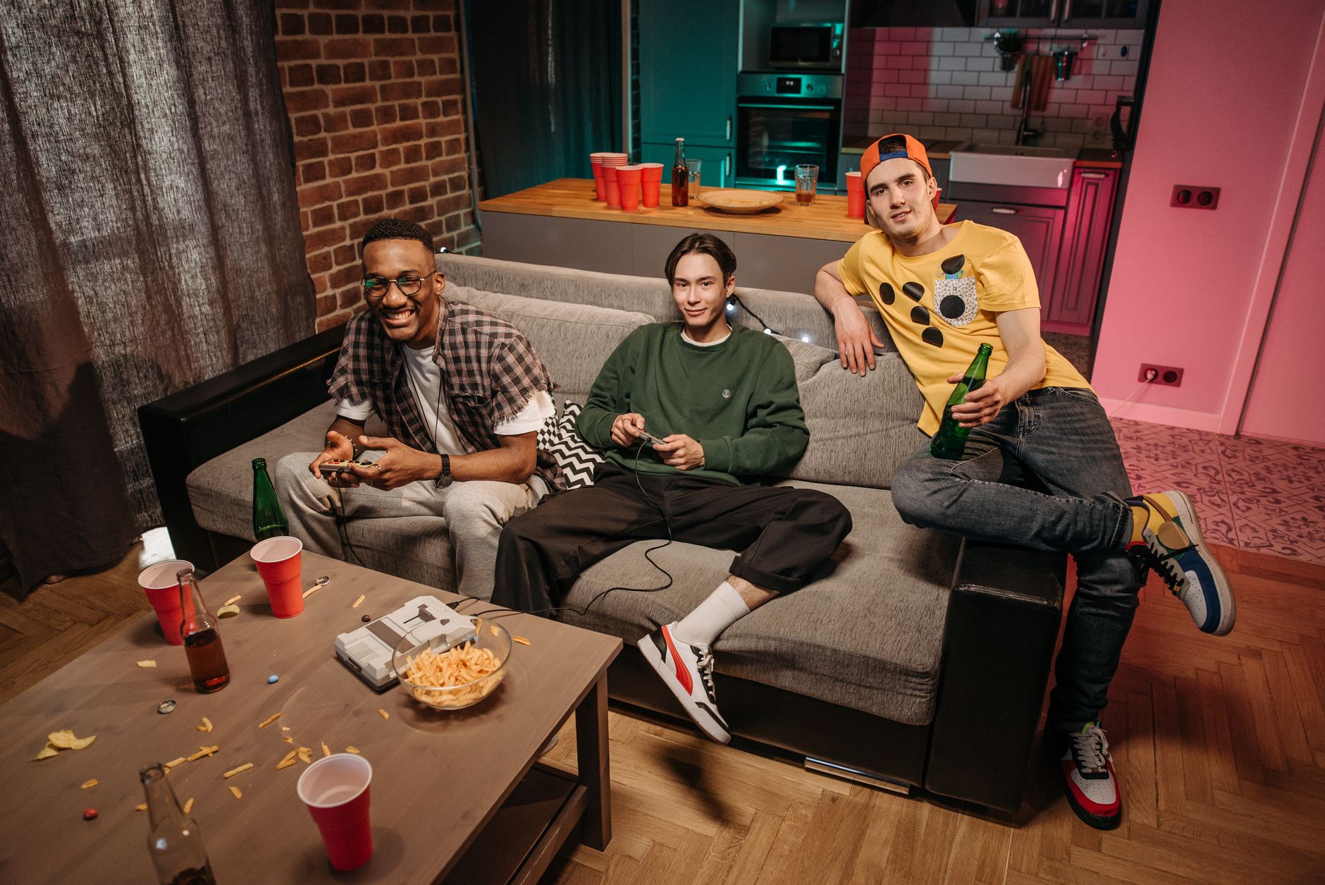 friends gathered around a gaming table, smartphones glowing, cautious nighttime atmosphere