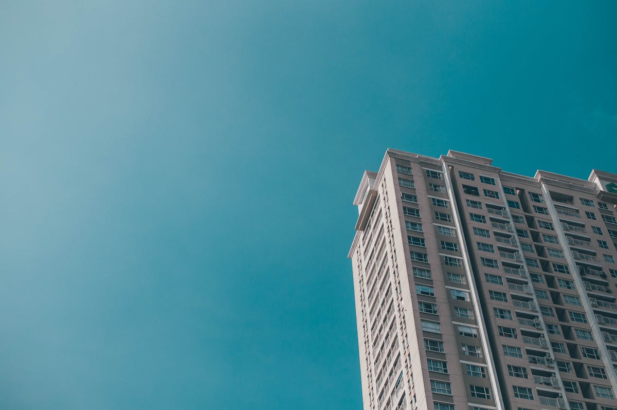 Two players relaxing on a sofa playing a colorful co-op game together