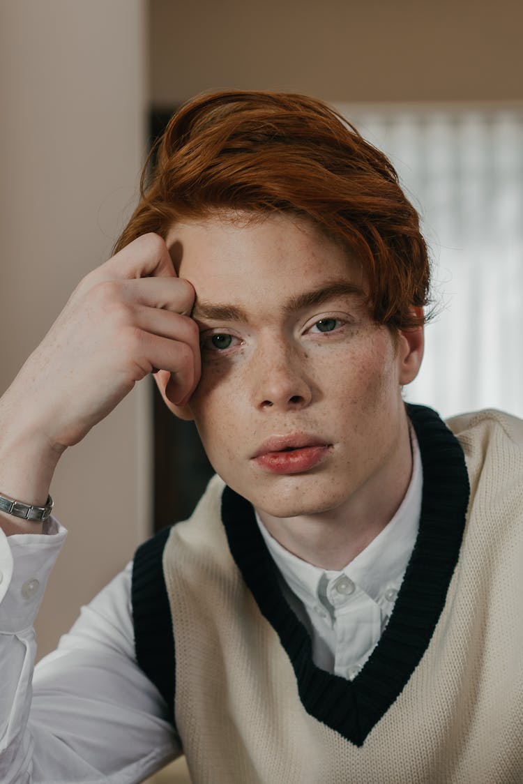 A Portrait Of A Man With Freckles