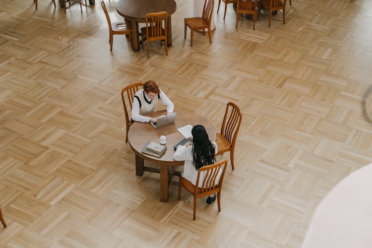 Man And Woman Studying Together