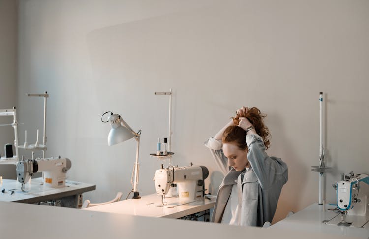 Woman Tying Her Hair