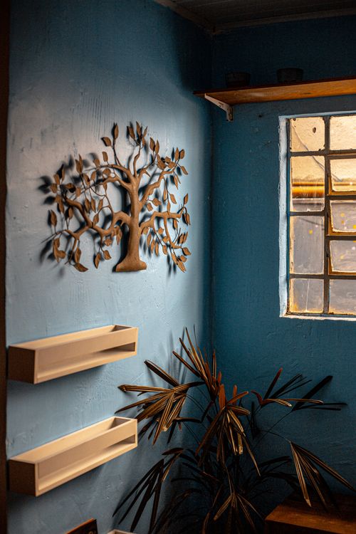 Wooden Rack on a Blue Wall · Free Stock Photo