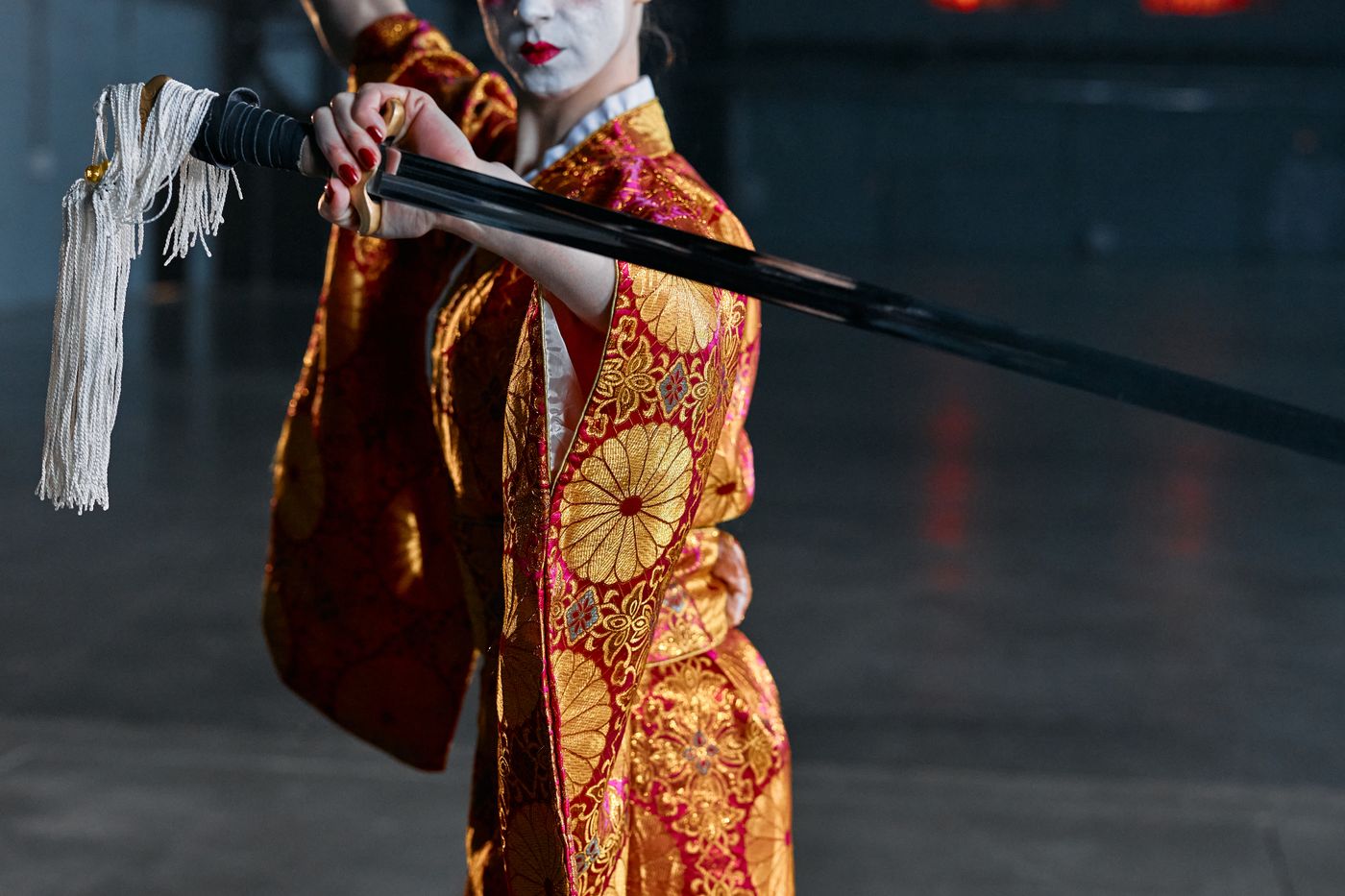 A katana resting on a stand