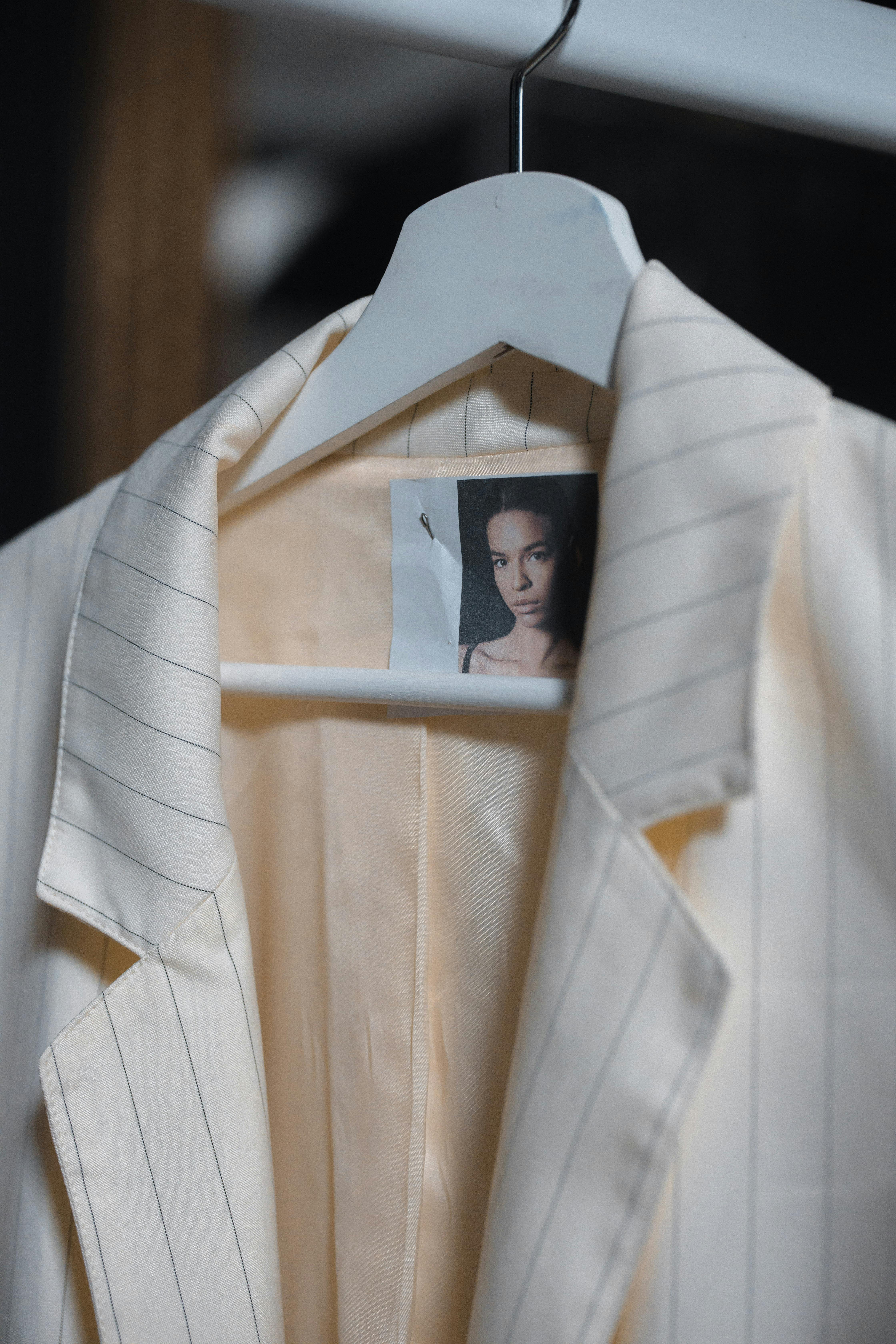 Striped Blazer on a Clothes Rack · Free Stock Photo