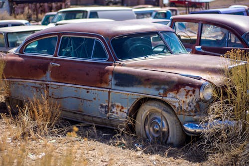 Close Up Photo of a Rusty Car