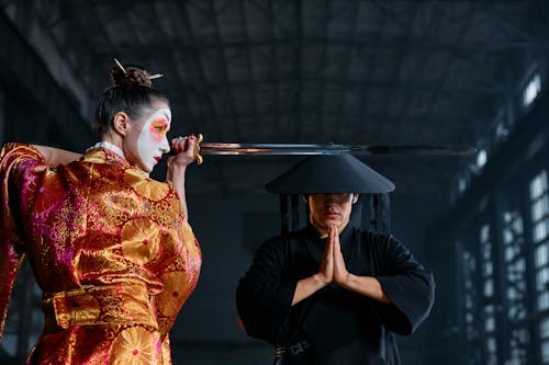 Man and Woman in Their Game Character Costumes