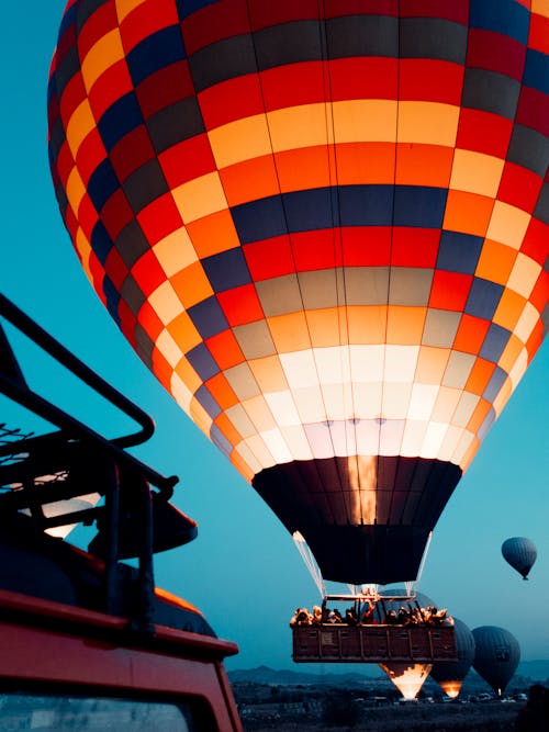 Colorful hot air balloon in countryside