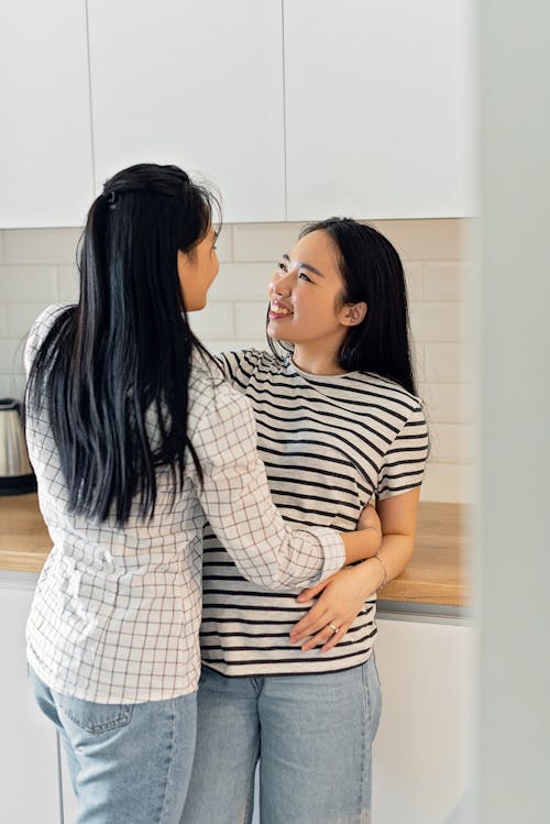 Free Women Happily Looking at Each Other  Stock Photo