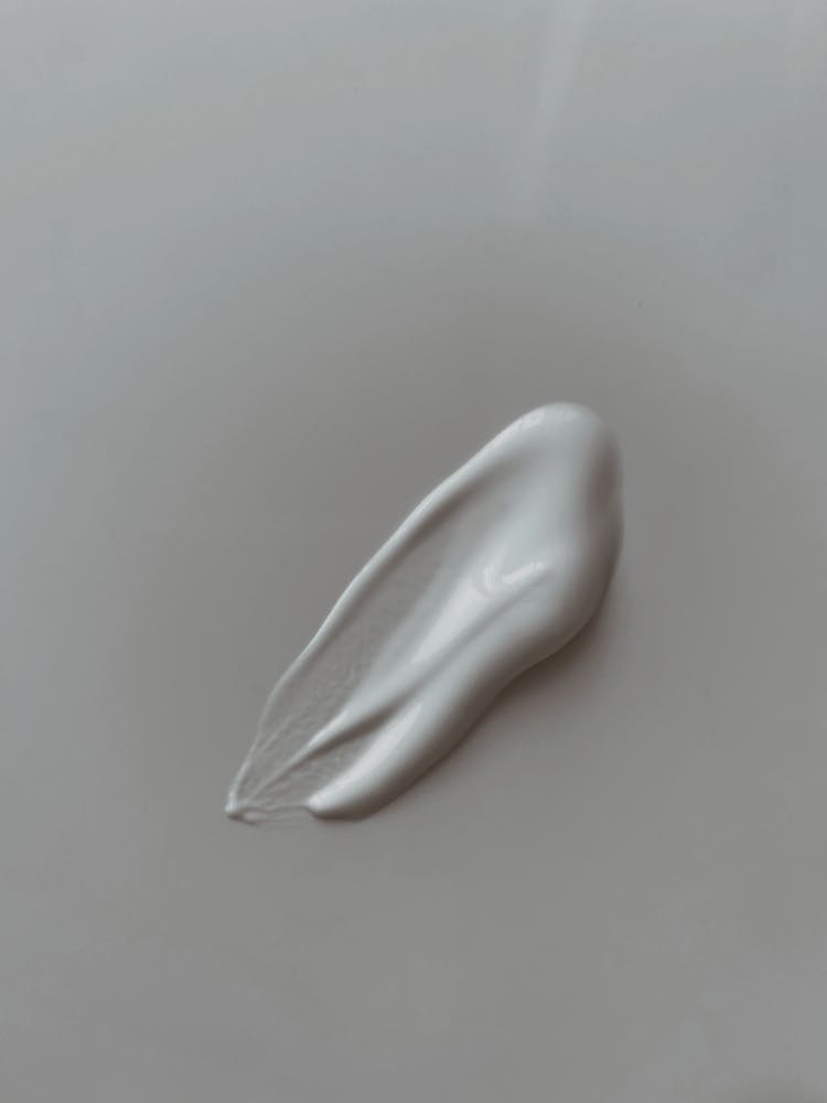 Close-Up Photo Of A White Paste On A White Surface