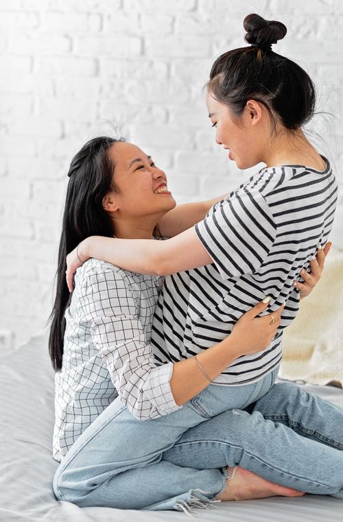 Free Happy couple sharing an intimate moment indoors, expressing love and joy. Stock Photo