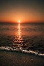 Wave Kissing the Shore at Sunset