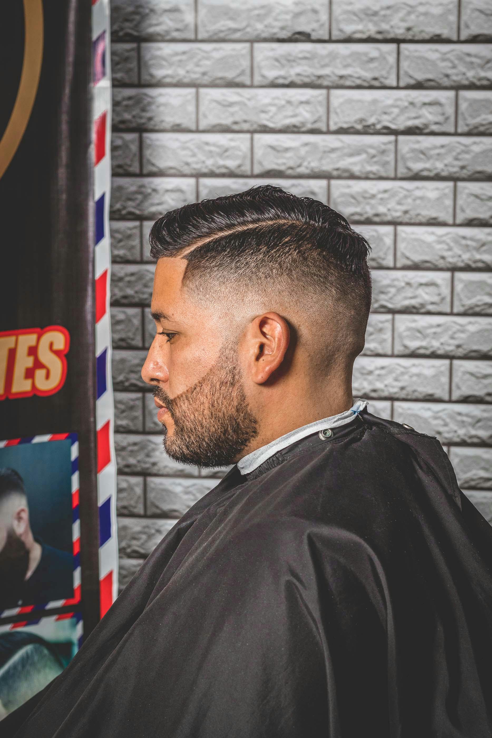 profile of a man at a barber