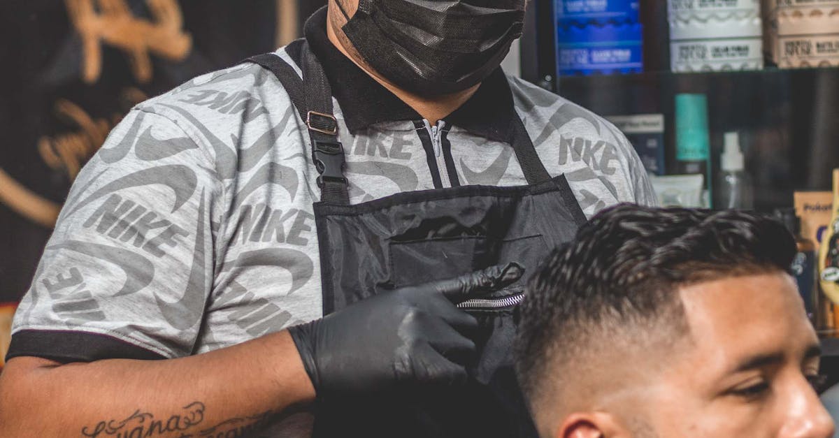 Man at Barber Chair During Haircut