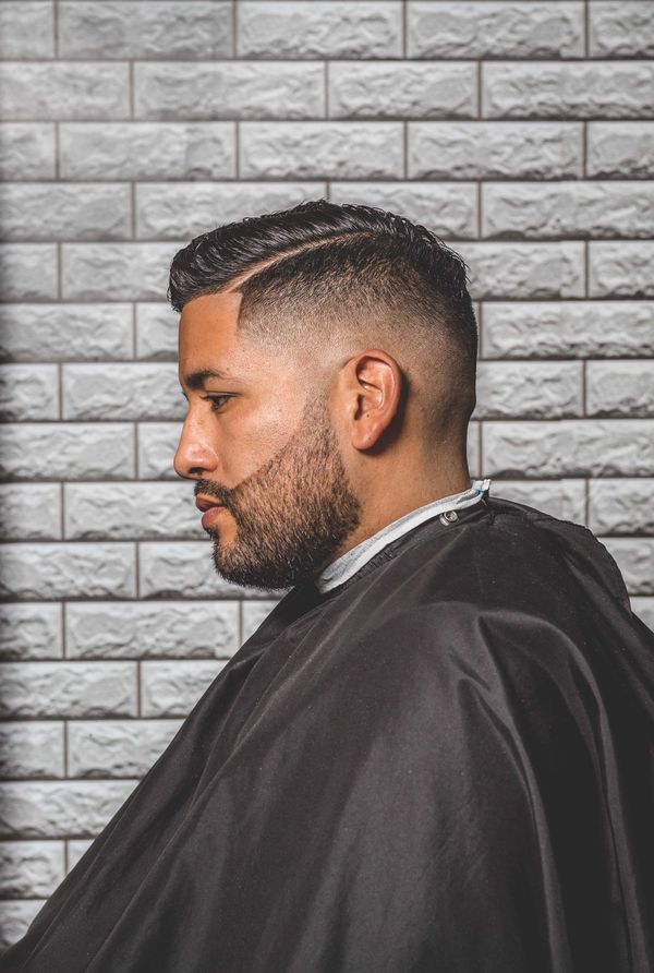 Modern haircut and beard styling