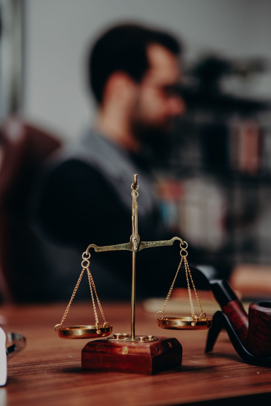 Scales of justice on a lawyer's desk