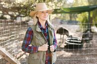 Woman Standing Neat the Wire Fence