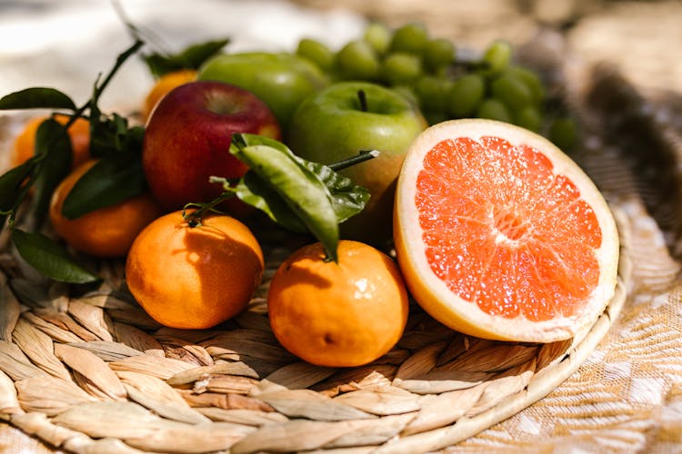 Close Up Shot Of A Citrus Fruits And Apples 