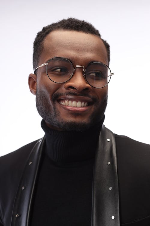 A Man With Eyeglasses Smiling 