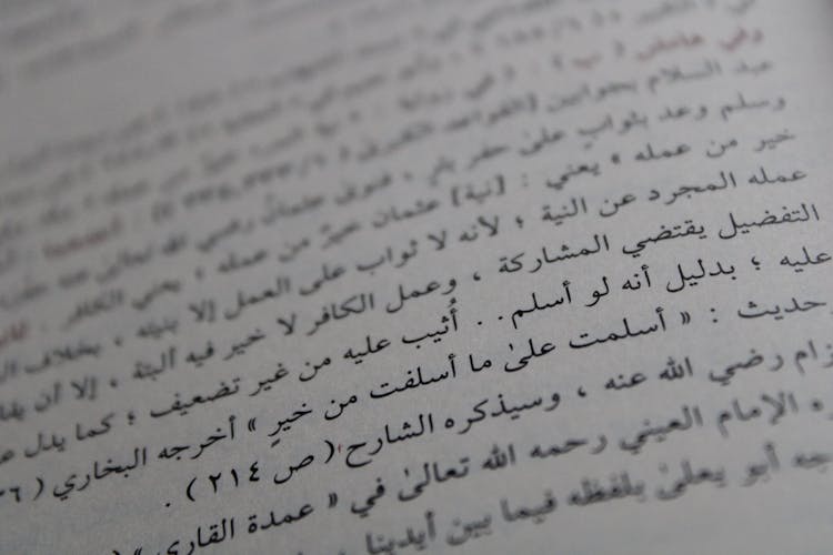 Extreme Close-up Photo Of Arabic Text