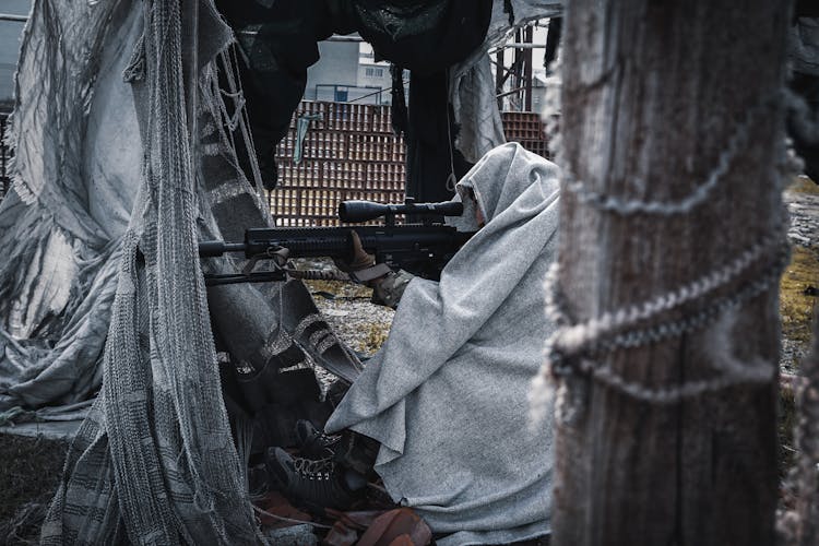 An Army Using A Sniper Rifle