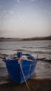 Blue Boat on Water