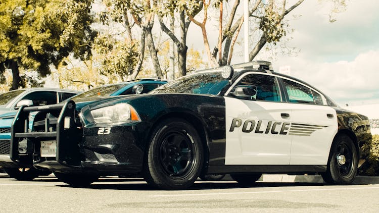 Low Angle Shot Of Parked Police Car