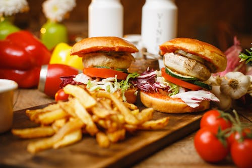 Photograph of Burgers on a Wooden Surface