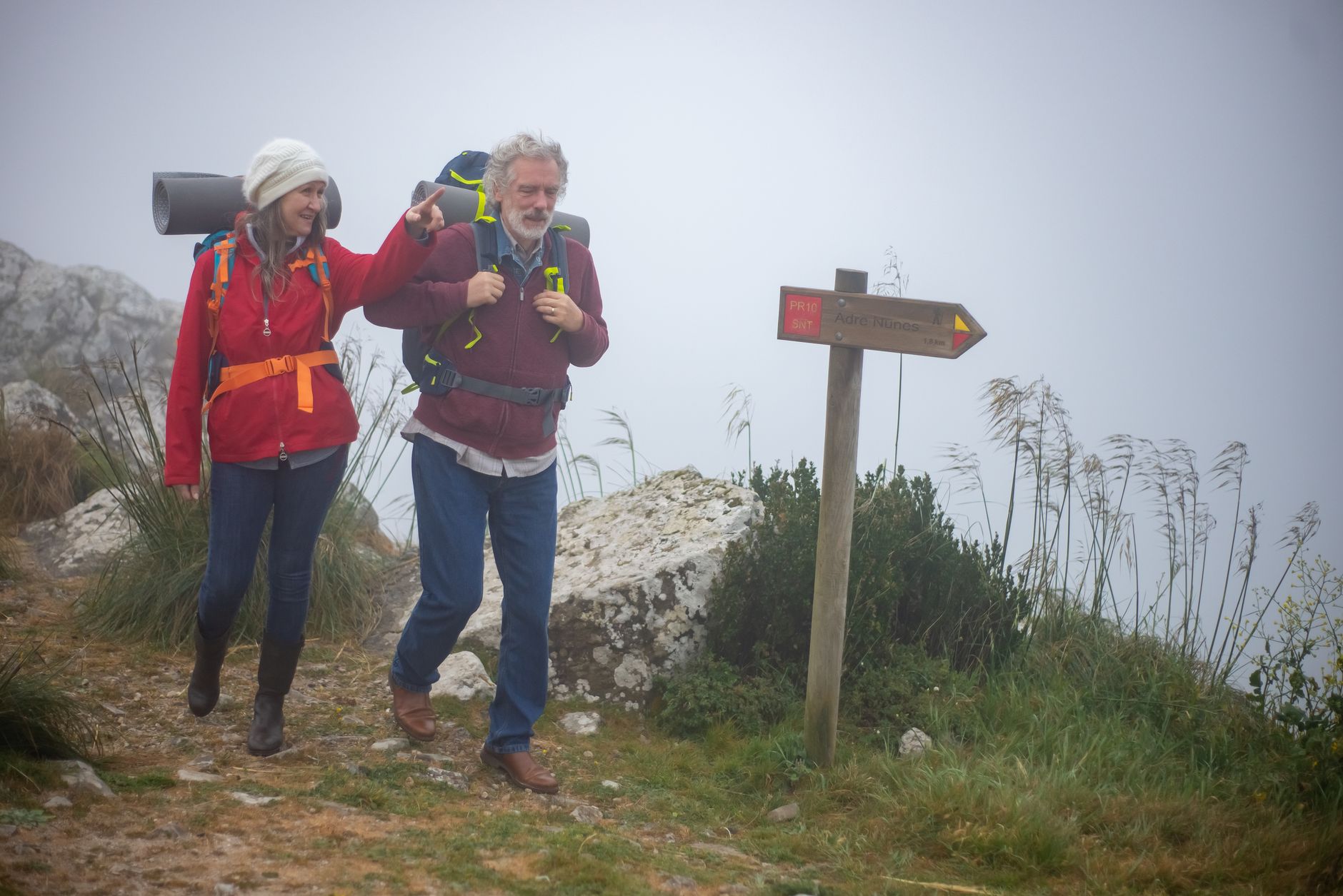 senior hiker mountain trail