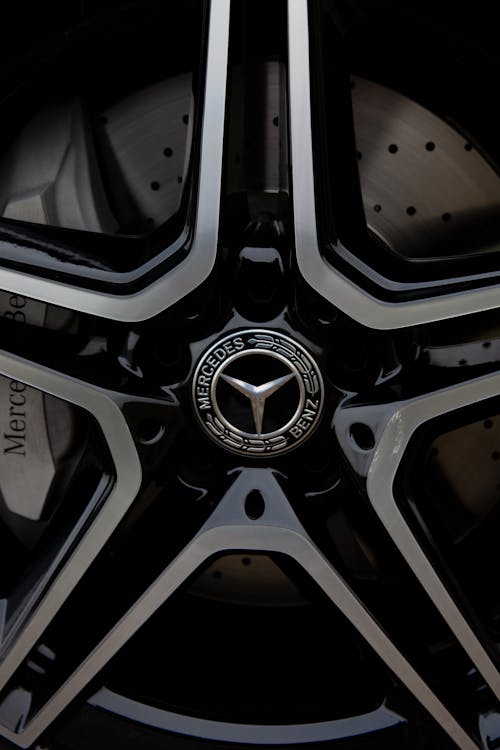 Steel rim of expensive car wheel with logo